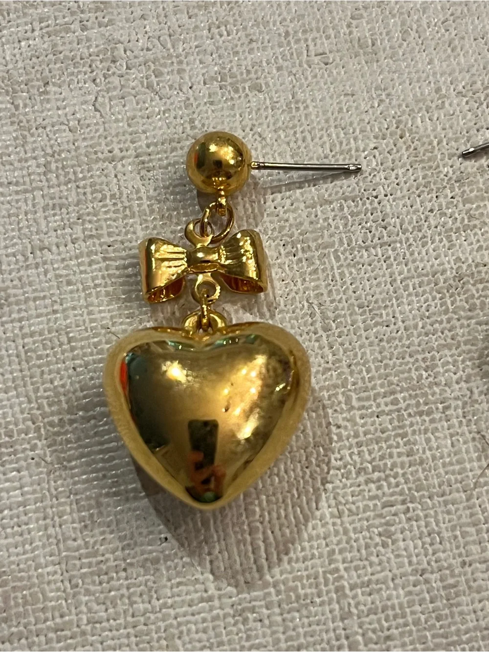 Vintage gold tone bow and puffy heart dangle earrings. So sweet!